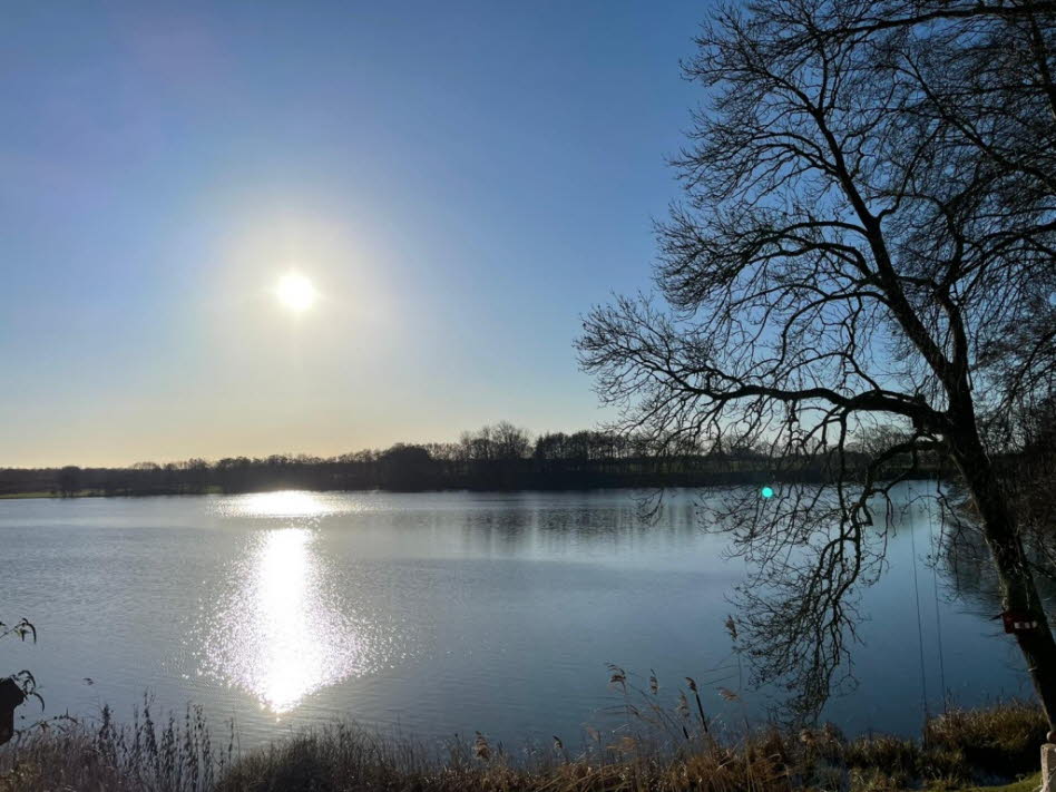Die Wintersonne �ber dem Schmalensee vom Ferienhaus aus betrachtet
